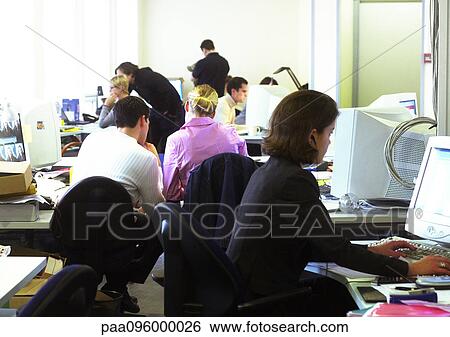 Stock Photograph - People working in office. Fotosearch