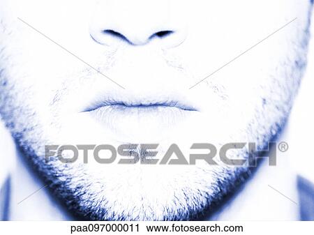 Lower part of man's face, close-up, blue tone View Large Photo Image Stock Image - Lower part of man's face, close-up, blue tone. Fotosearch