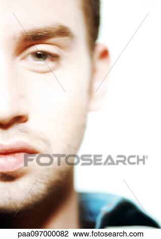 Stock Image - Man's face, partial view, close-up, portrait. Fotosearch