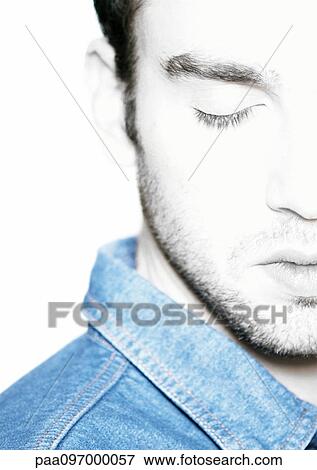 Man's face with closed eye, partial view, close-up View Large Photo Image Stock Photo - Man's face with closed eye, partial view, close-up. Fotosearch
