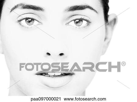 Stock Image - Woman's face, close-up, portrait, B&W. Fotosearch