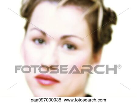 Stock Photo - Woman's face, close-up, portrait, blurred. Fotosearch