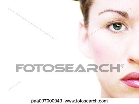 Stock Image - Woman's face, partial view, close-up, portrait. Fotosearch
