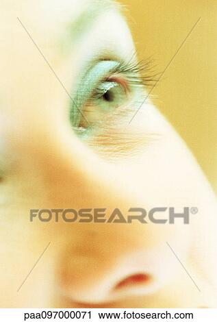 Stock Image - Woman's face, partial view, close-up. Fotosearch