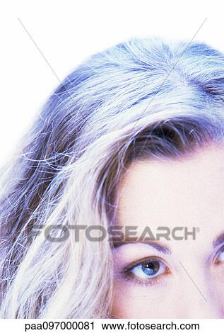 Stock Image - Woman's face, partial view, close-up. Fotosearch