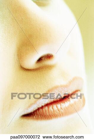 Stock Image - Woman's face, partial view, extreme close-up. Fotosearch