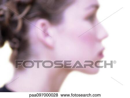 Stock Photo - Woman's face, side view, blurred. Fotosearch