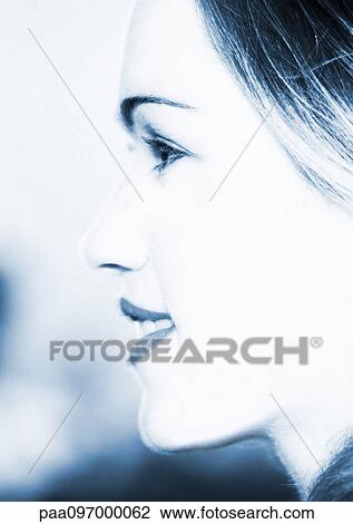 Stock Image - Woman's face, side view, close-up. Fotosearch