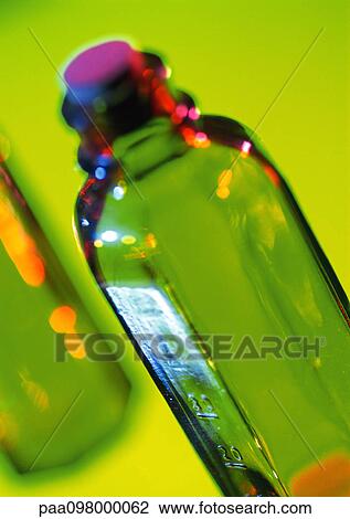 Stock Image - Glass bottle, close-up. Fotosearch