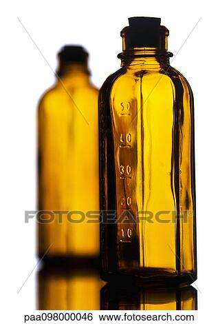 Glass bottles, close-up View Large Photo Image Stock Photograph - Glass bottles, close-up. Fotosearch