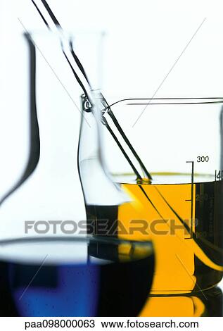 Stock Image - Glass flasks, close-up. Fotosearch
