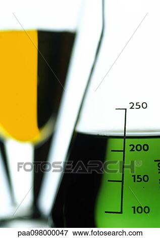 Glass flasks filled with colorful liquids, close-up View Large Photo Image Stock Photo - Glass flasks filled with colorful liquids, close-up. Fotosearch