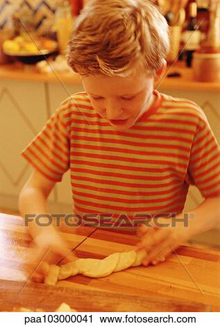 Child handling pastry dough, blurred motion View Large Photo Image Stock Image - Child handling pastry dough, blurred motion. Fotosearch