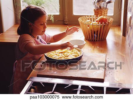 Child preparing pie View Large Photo Image Stock Photography - Child preparing pie. Fotosearch
