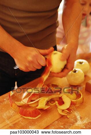 Hands peeling apples View Large Photo Image Stock Image - Hands peeling apples. Fotosearch
