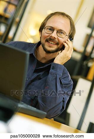 Man using cell phone, portrait View Large Photo Image Stock Photo - Man using cell phone, portrait. Fotosearch