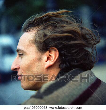 Man smiling, side view View Large Photo Image Stock Photo - Man smiling, side view. Fotosearch
