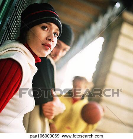 Young people, low angle view View Large Photo Image Stock Photo - Young people, low angle view. Fotosearch