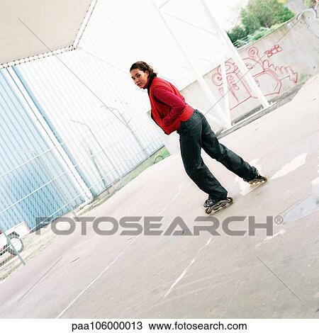 Young woman wearing inline skates, profile View Large Photo Image Stock Image - Young woman wearing inline skates, profile. Fotosearch