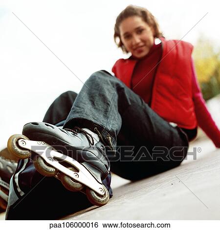 Young woman wearing inline skates, portrait View Large Photo Image Stock Photograph - Young woman wearing inline skates, portrait. Fotosearch