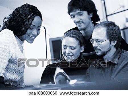 Business people examining book, blue tone View Large Photo Image Stock Photograph - Business people examining book, blue tone. Fotosearch