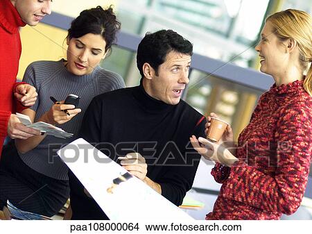 Picture - Business people working in office. Fotosearch