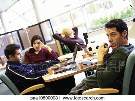 People sitting in office View Large Photo Image Stock Image - People sitting in office. Fotosearch
