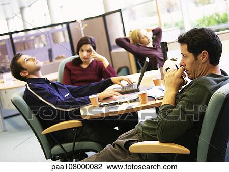 People sitting in office View Large Photo Image Stock Image - People sitting in office. Fotosearch