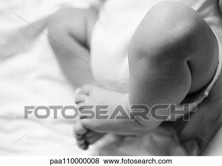 Baby's legs, close-up, b&w View Large Photo Image Stock Photo - Baby's legs, close-up, b&w. Fotosearch