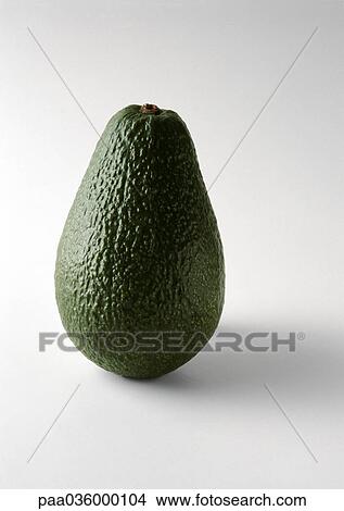 Picture - Avocado, standing on end, close-up. Fotosearch
