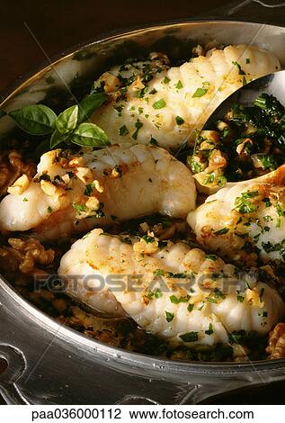 Filets of monkfish in dish with herbs, close-up View Large Photo Image Stock Image - Filets of monkfish in dish with herbs, close-up. Fotosearch