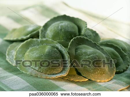 Fresh spinach ravioli, on green and white checked tablecloth, close-up View Large Photo Image Stock Photography - Fresh spinach ravioli, on green and white checked tablecloth, close-up. Fotosearch
