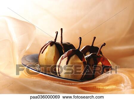 Pear Belle Helen, on plate View Large Photo Image Stock Photo - Pear Belle Helen, on plate. Fotosearch