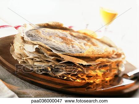 Pile of crepes on plate, close-up View Large Photo Image Stock Photo - Pile of crepes on plate, close-up. Fotosearch