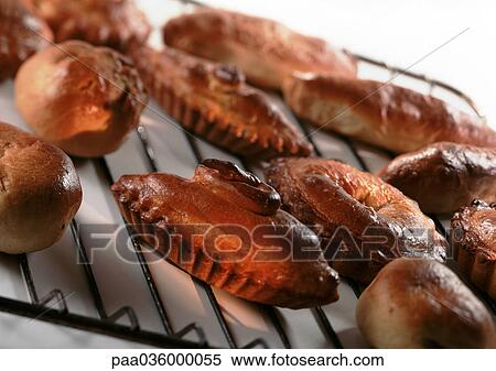 Various russian pastries on rack, close-up View Large Photo Image Stock Photography - Various russian pastries on rack, close-up. Fotosearch