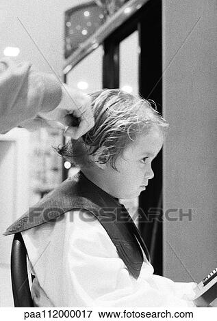 Stock Photo - Girl at hairdresser, side view, b&w. Fotosearch