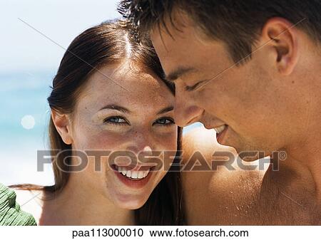 Close-up of man looking down at woman. View Large Photo Image Stock Image - Close-up of man looking down at woman.. Fotosearch