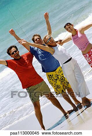 Family at the beach. View Large Photo Image Stock Photography - Family at the beach.. Fotosearch