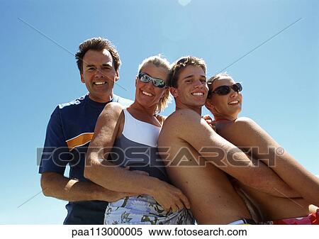 Family portrait, shot from below. View Large Photo Image Stock Photography - Family portrait, shot from below.. Fotosearch