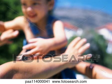 Child reaching arms toward adult, blurred View Large Photo Image Stock Image - Child reaching arms toward adult, blurred. Fotosearch