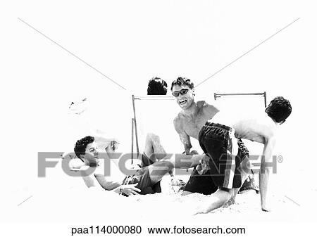 Family playing on beach, b&w View Large Photo Image Stock Image - Family playing on beach, b&w. Fotosearch