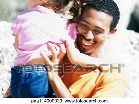 Father and daughter on beach, close-up, blurred View Large Photo Image Stock Image - Father and daughter on beach, close-up, blurred. Fotosearch