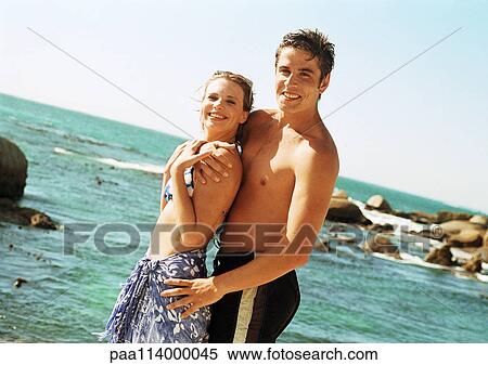 Man and woman at beach View Large Photo Image Stock Photography - Man and woman at beach. Fotosearch