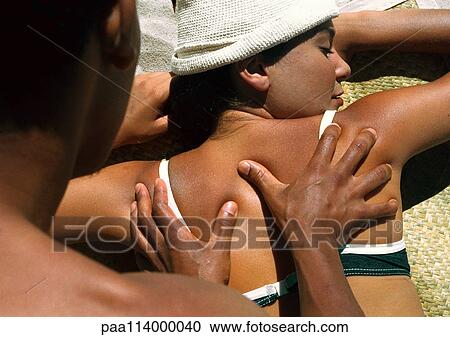 Man massaging woman's back View Large Photo Image Stock Image - Man massaging woman's back. Fotosearch