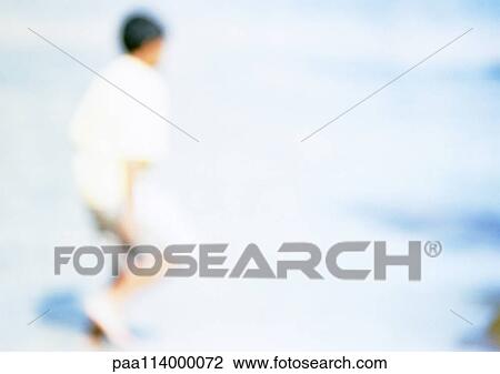 Person on beach, blurred View Large Photo Image Stock Image - Person on beach, blurred. Fotosearch