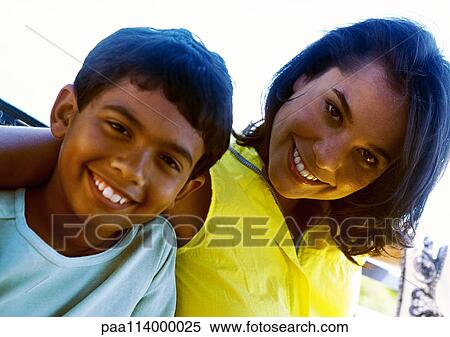 Stock Photography - Woman and boy, close-up, portrait. Fotosearch