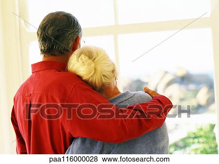 Couple hugging, rear view View Large Photo Image Stock Photo - Couple hugging, rear view. Fotosearch