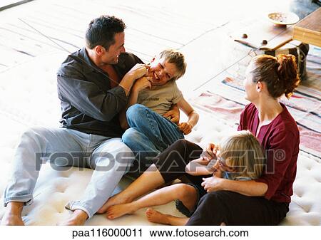 Parents and children playing View Large Photo Image Stock Image - Parents and children playing. Fotosearch