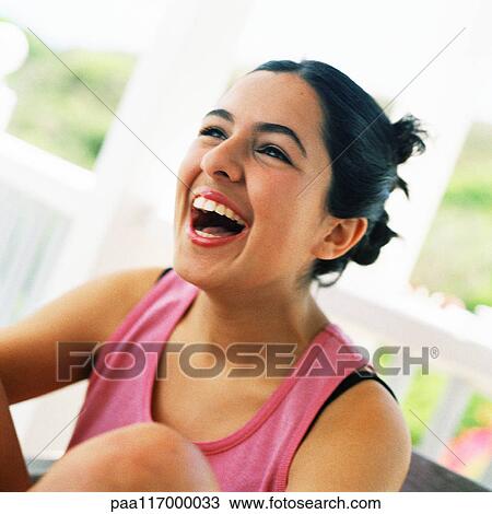 Stock Image - Girl smiling, portrait. Fotosearch