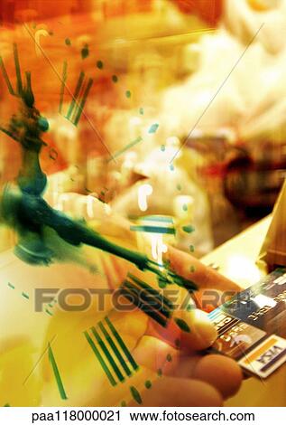 Clock and hand holding credit card, superimposed pictures View Large Photo Image Stock Image - Clock and hand holding credit card, superimposed pictures. Fotosearch
